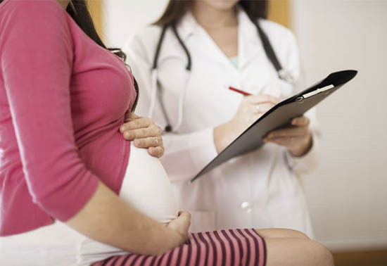 Беременная у врача